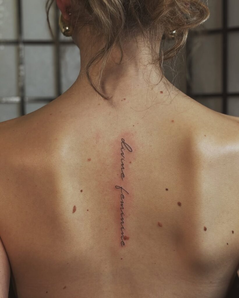 feminine power tattoo