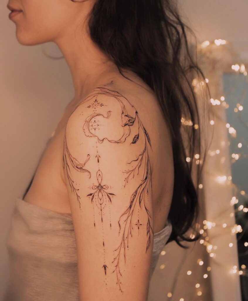 devine feminine power tattoo