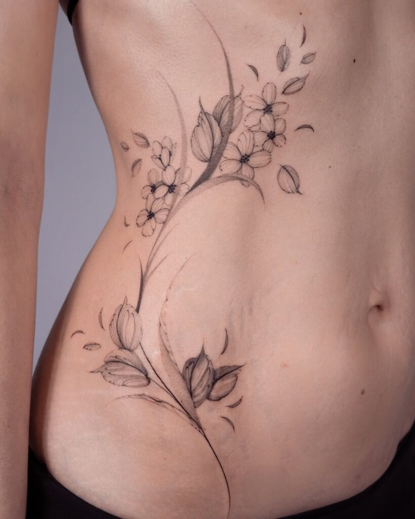 feminine fine line tattoo