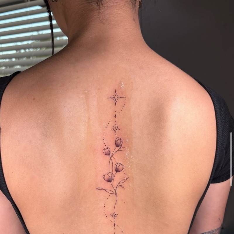 spine flower tattoos