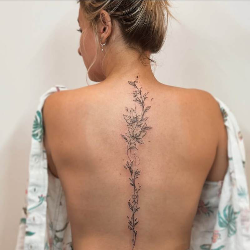 spine flower tattoos for women