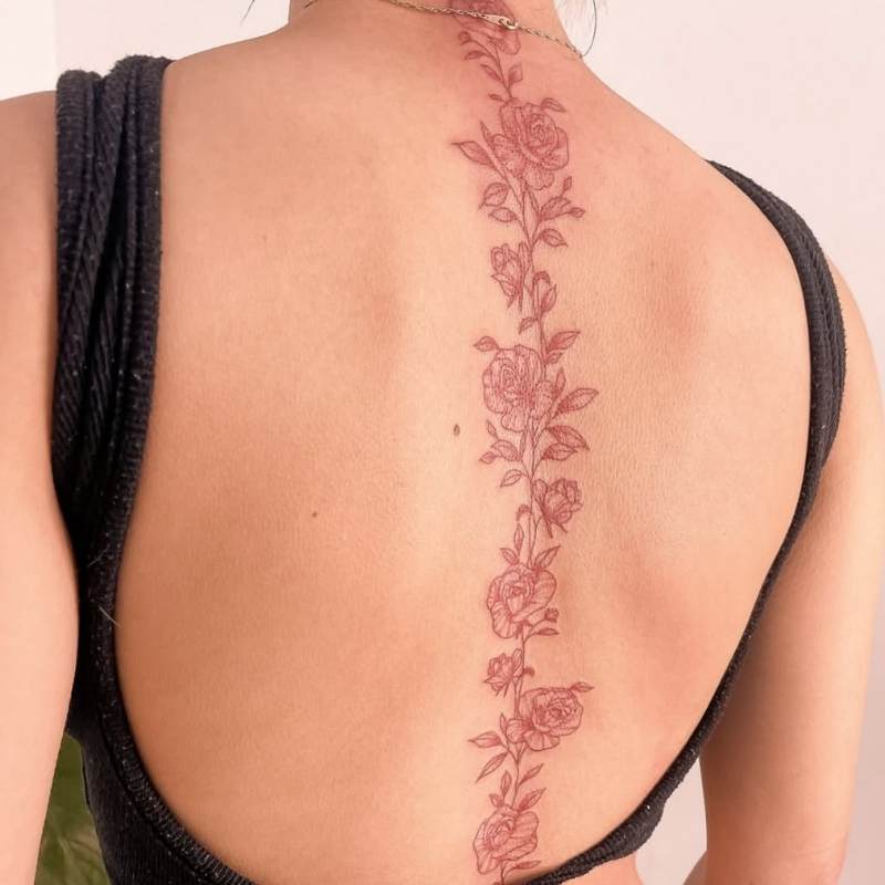  flower spine tattoo for women