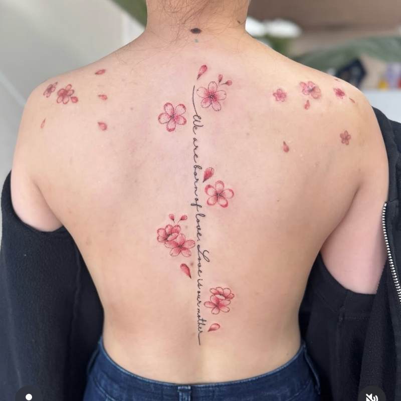 spine flower tattoos